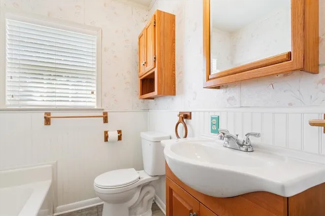 a bathroom with a sink and a toilet