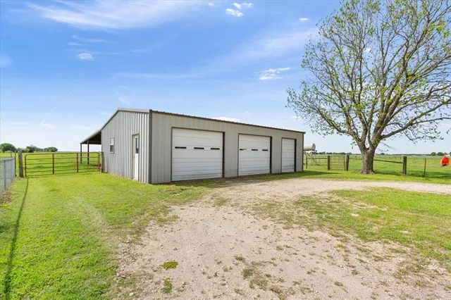 a house view with a backyard space
