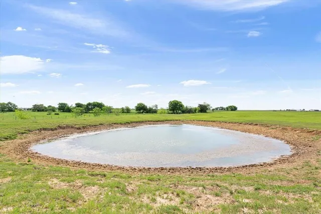 a view of an ocean and city