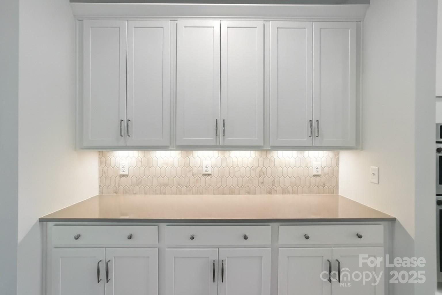 5409 Verona Road Charlotte, NC 28213 - Photo 12 of 20 a view of cabinets with wooden floor