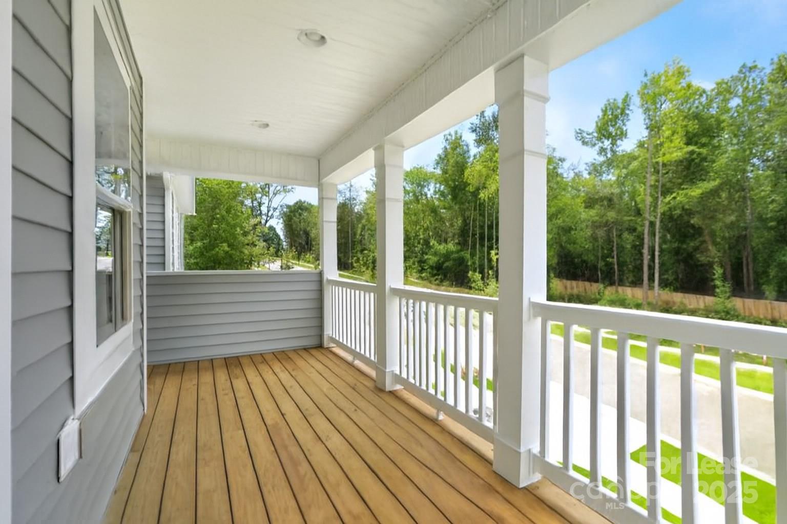 5409 Verona Road Charlotte, NC 28213 - Photo 14 of 20 a view of a balcony with wooden floor
