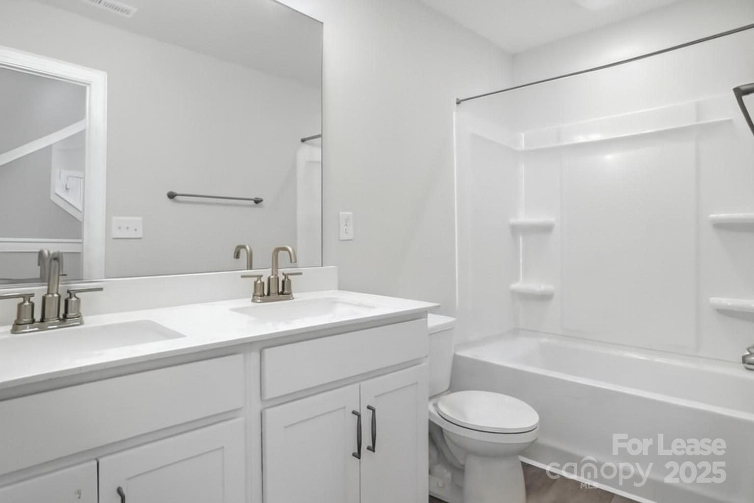 5409 Verona Road Charlotte, NC 28213 - Photo 17 of 20 a bathroom with a sink a toilet and a bathtub