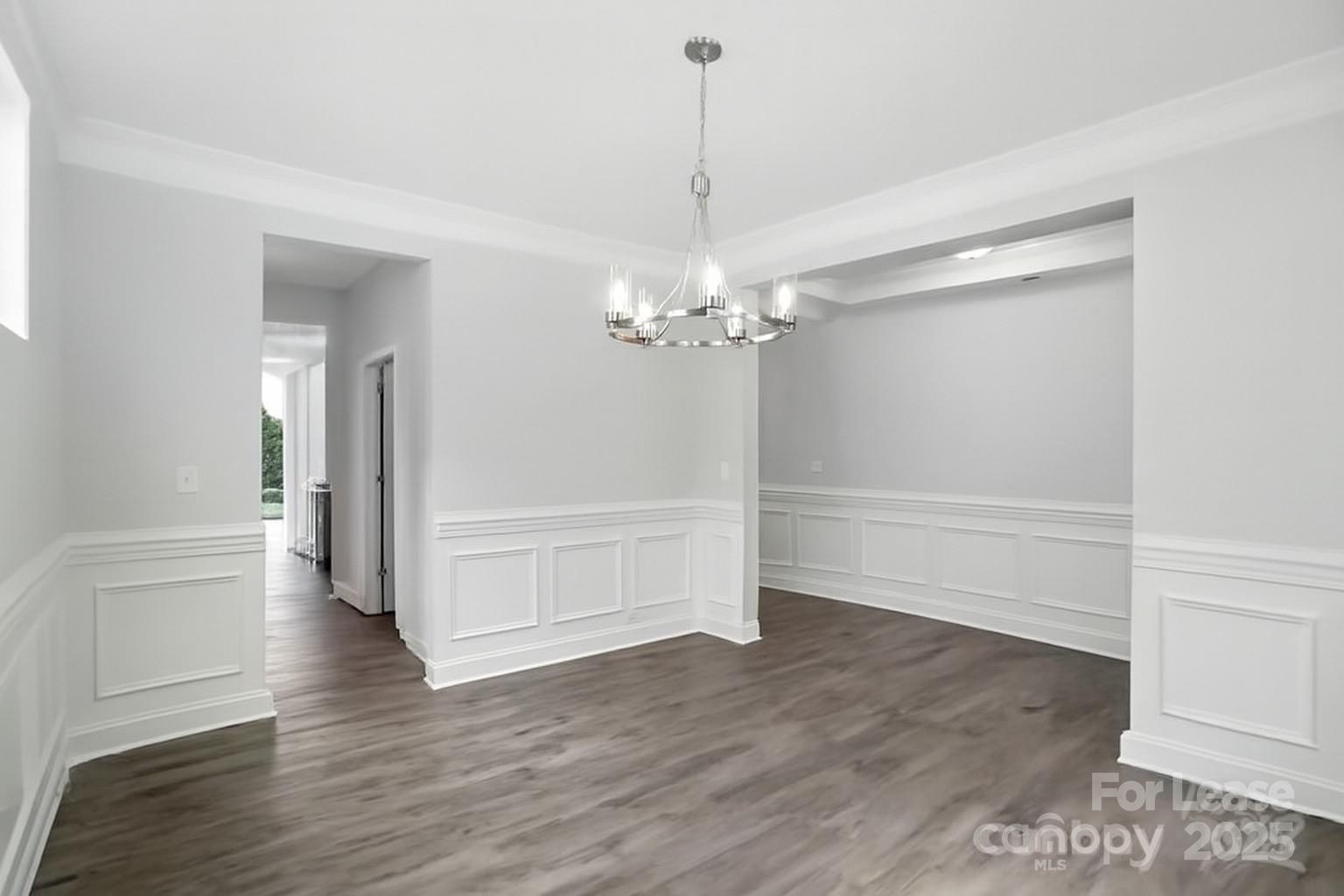 5409 Verona Road Charlotte, NC 28213 - Photo 4 of 20 a view of a chandelier in an empty room