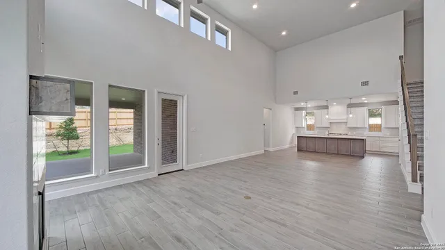 a view of a living room and hardwood floor