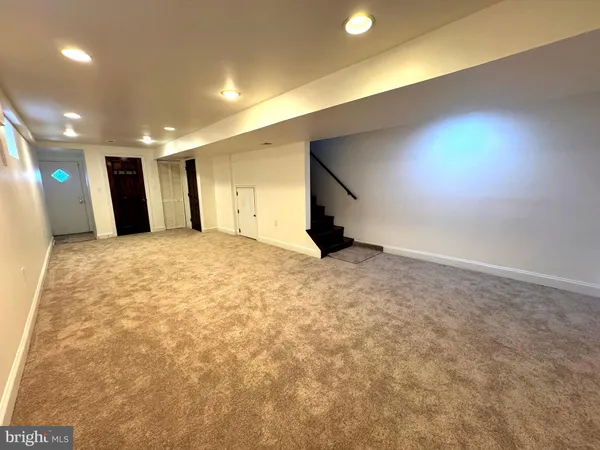 a view of a hall with a chair