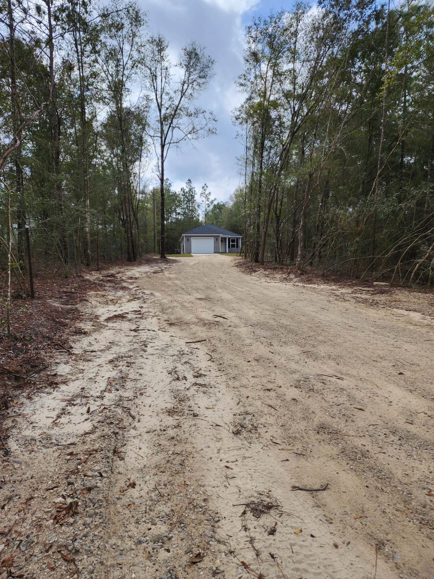 1249 Martin Road DeFuniak Springs, FL 32433 - Photo 14 of 15 a view of outdoor space with trees