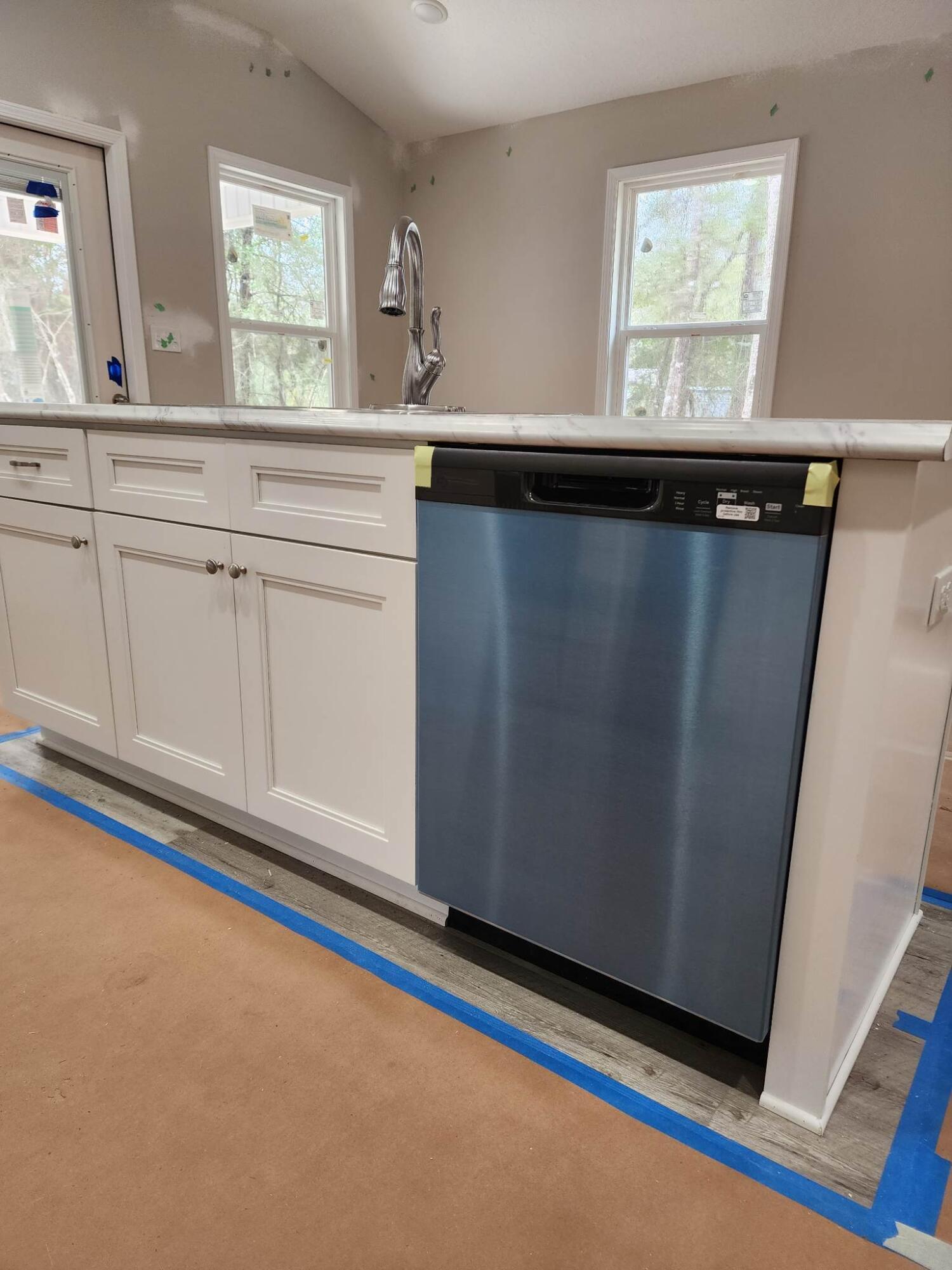 1249 Martin Road DeFuniak Springs, FL 32433 - Photo 3 of 15 a kitchen with granite countertop a sink and a window