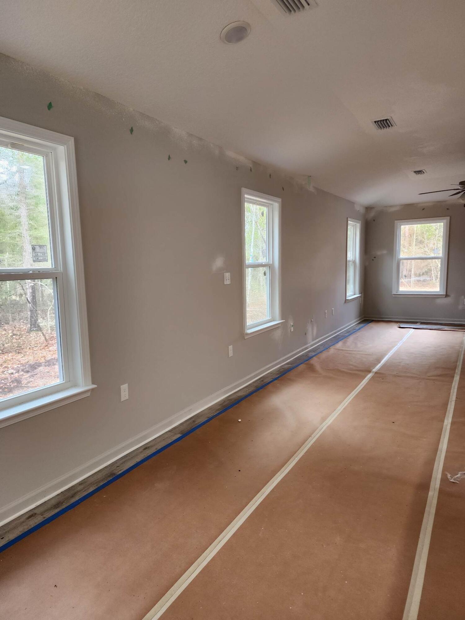1249 Martin Road DeFuniak Springs, FL 32433 - Photo 4 of 15 a view of an empty room with a window
