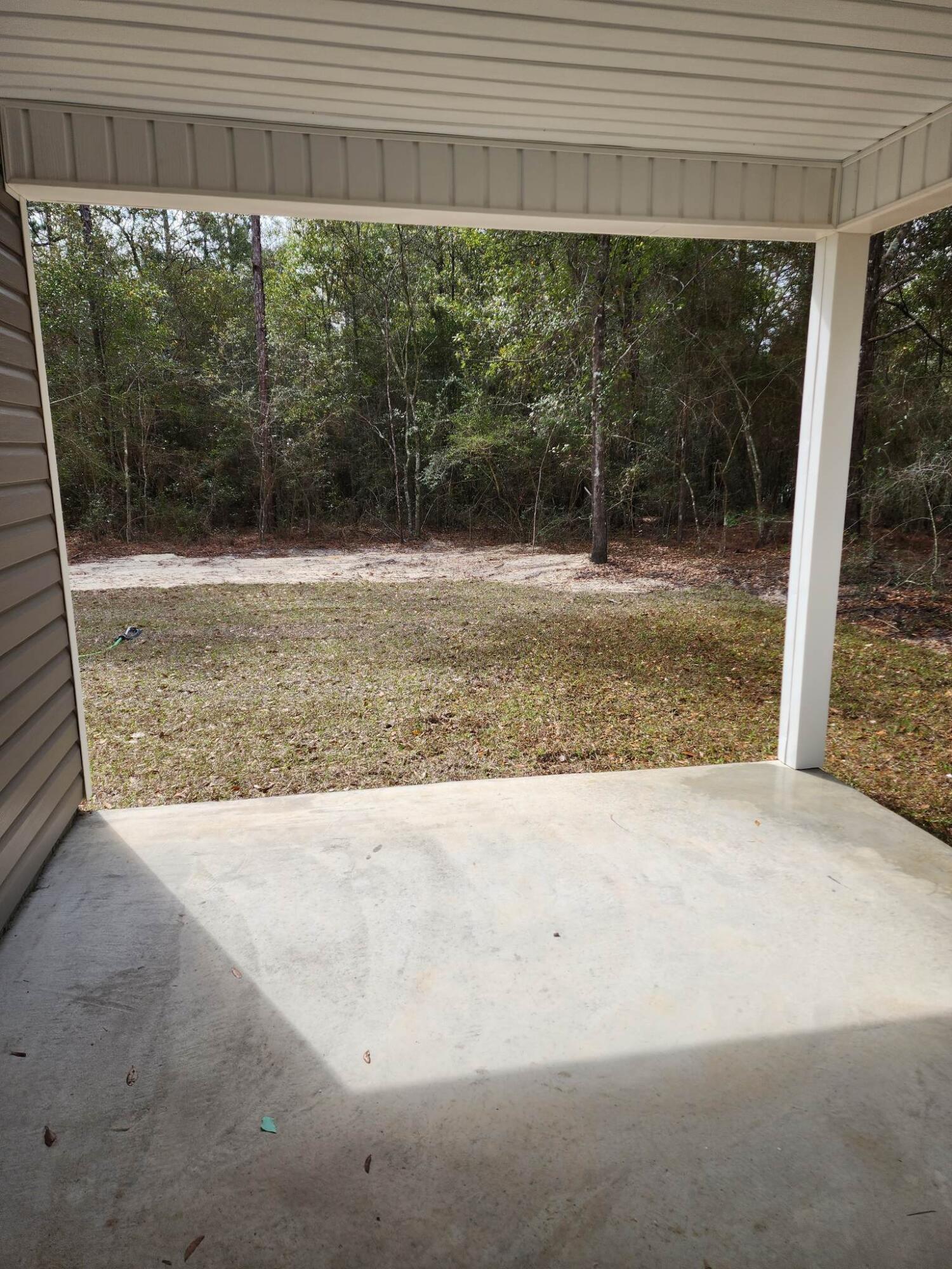 1249 Martin Road DeFuniak Springs, FL 32433 - Photo 10 of 15 a view of backyard with green space