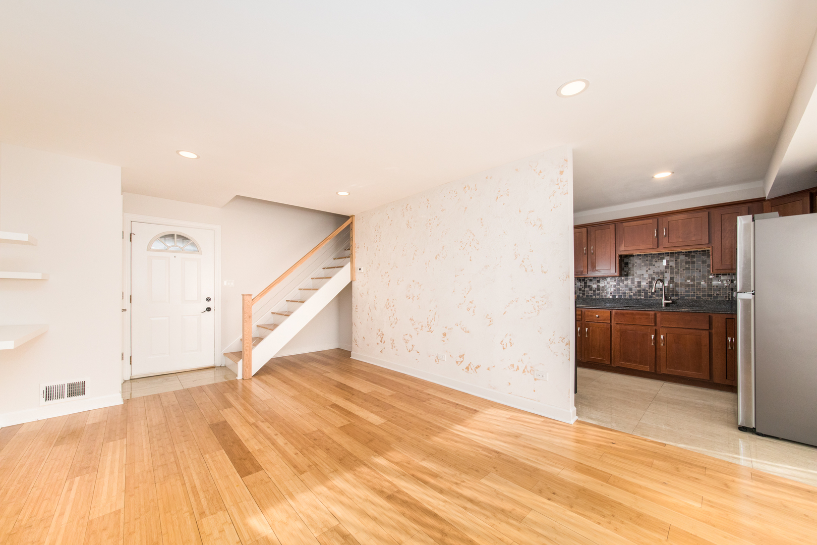 26 Cour Versaille, Unit 26 Palos Hills, IL 60465 - Photo 8 of 24 a view of a kitchen with a sink and a refrigerator