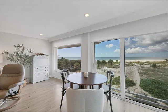 a view of a livingroom with furniture and window