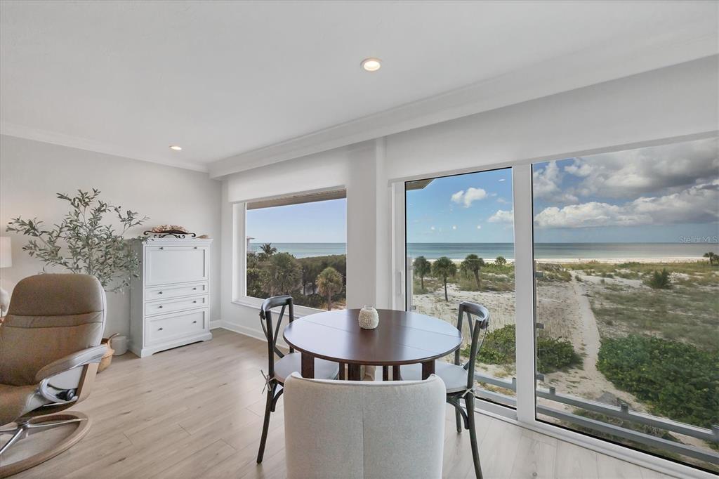 5000 Gasparilla Road, Unit 304 Boca Grande, FL 33921 - Photo 13 of 30 a view of a livingroom with furniture and window