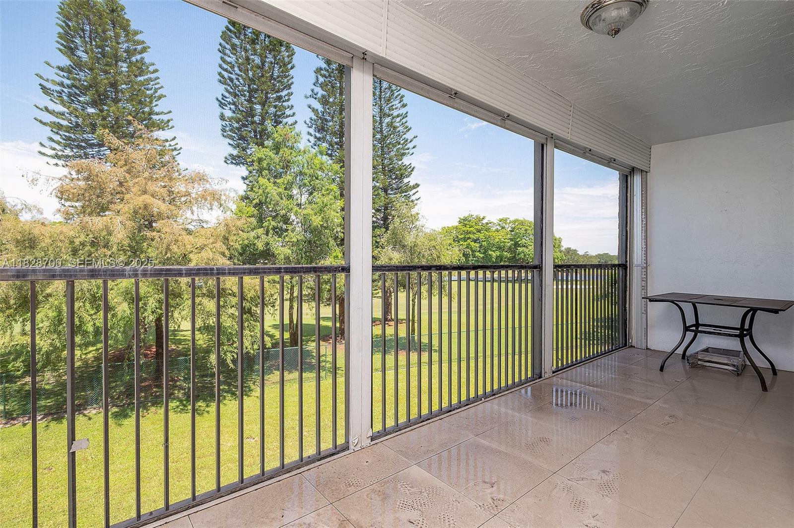 3150 West Rolling Hills Circle, Unit 307 Davie, FL 33328 - Photo 12 of 20 a view of a porch