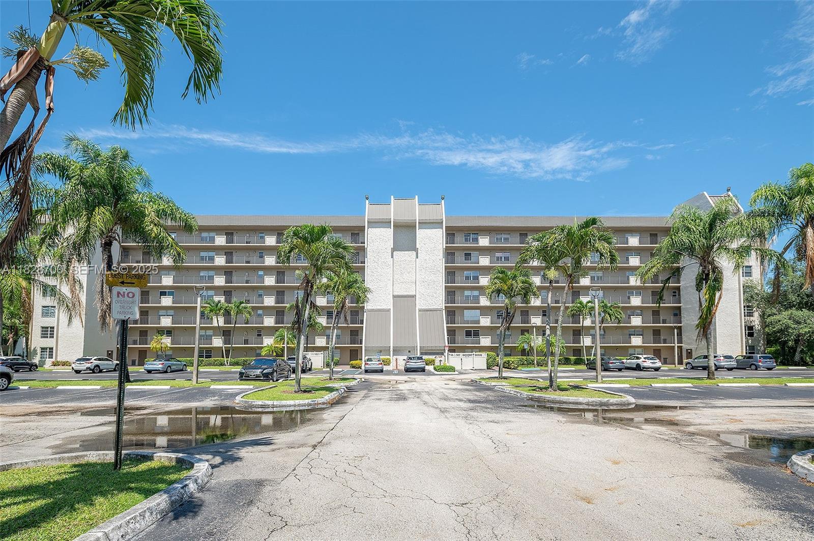 3150 West Rolling Hills Circle, Unit 307 Davie, FL 33328 - Photo 16 of 20 a view of a multi story building