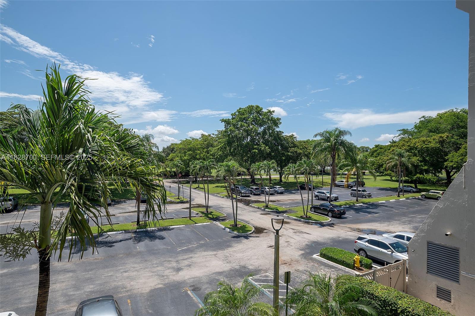 3150 West Rolling Hills Circle, Unit 307 Davie, FL 33328 - Photo 18 of 20 a view of a park with swings and slides