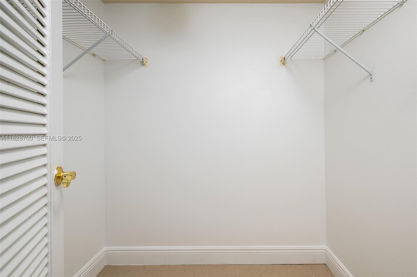 3150 West Rolling Hills Circle, Unit 307 Davie, FL 33328 - Photo 10 of 20 a view of small space with racks on the wall