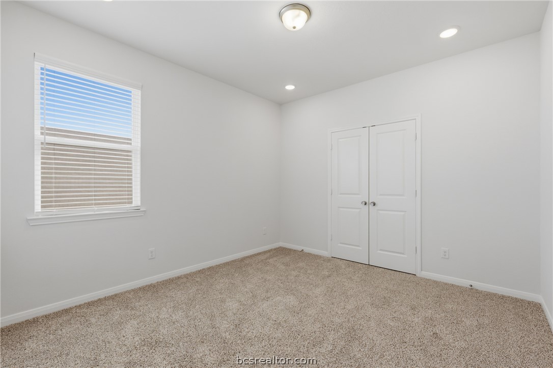 1922 Viva Road Bryan, TX 77807 - Photo 31 of 45 Spacious upstairs bedroom with comfortable layout and abundant natural light.