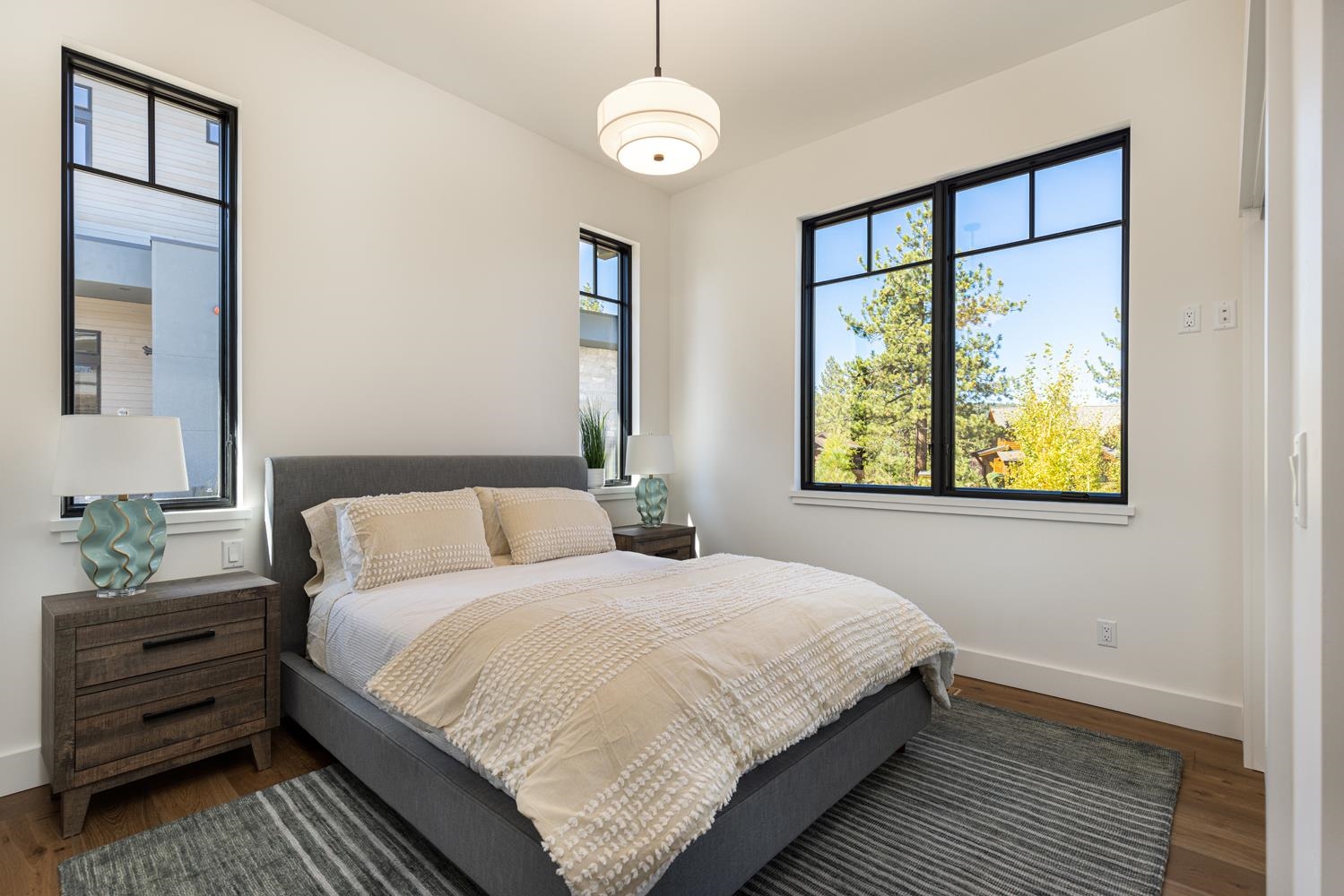 11654 Henness Road Truckee, CA 96161 - Photo 18 of 21 Main level second primary suite with ensuite bath. Bath has heated floors & Restoration Hardware.