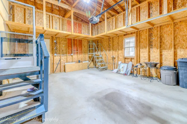 a view front of house with backyard and trees