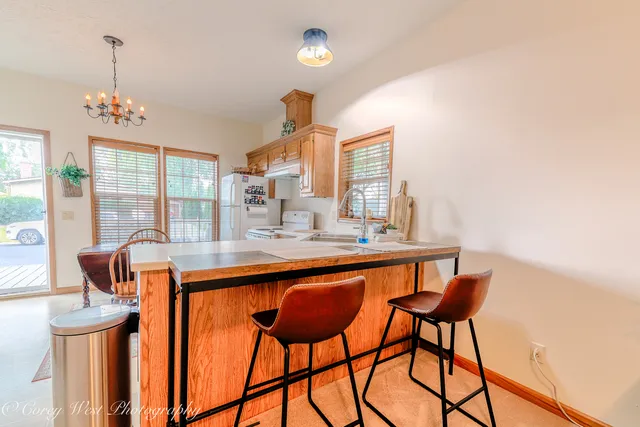 a view of balcony with furniture