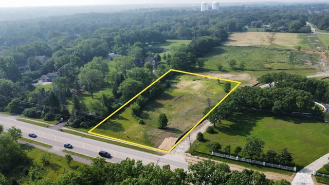 an aerial view of residential house with outdoor space
