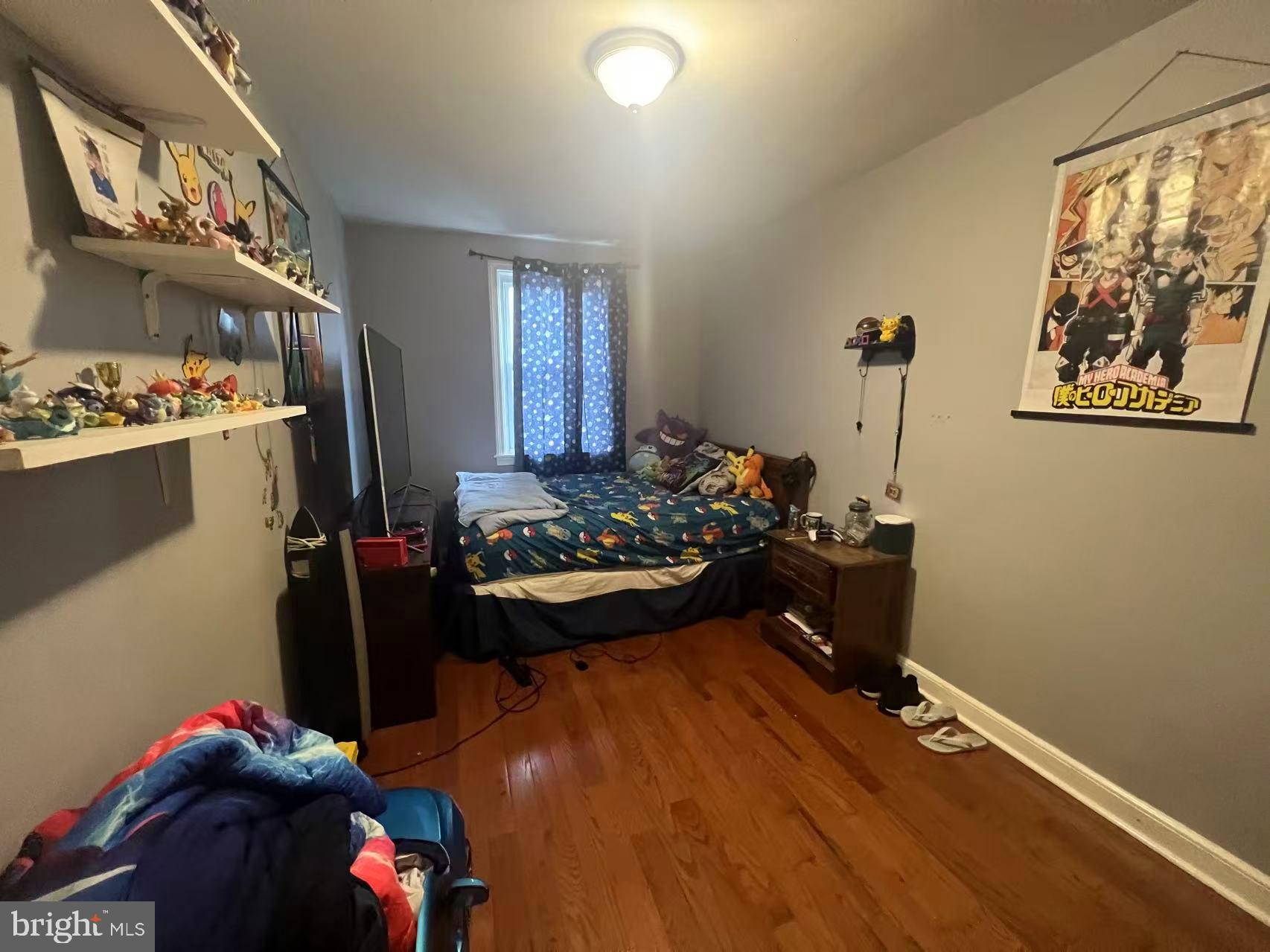 3147 Friendship Street Philadelphia, PA 19149 - Photo 12 of 16 a bed room with a bed and a window