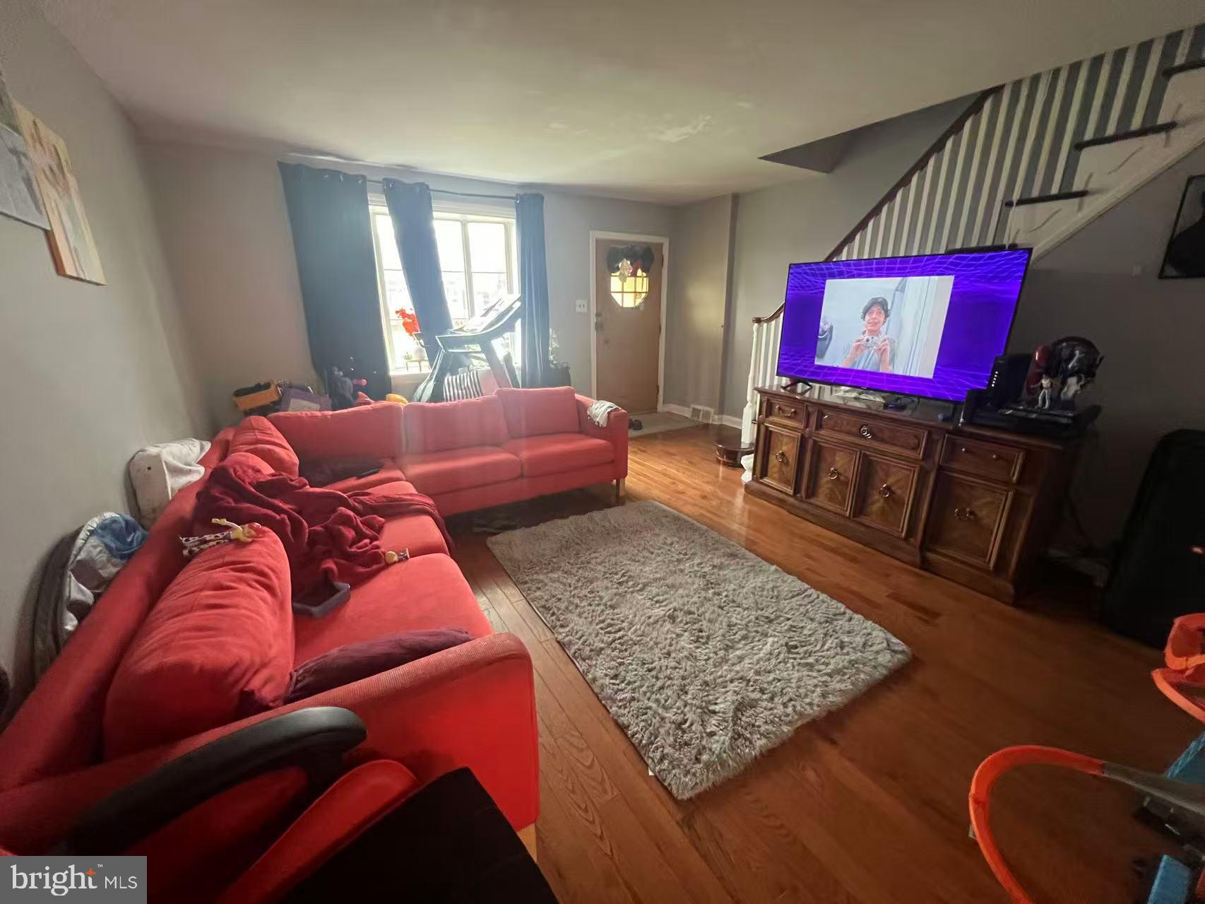 3147 Friendship Street Philadelphia, PA 19149 - Photo 4 of 16 a living room with furniture rug and window