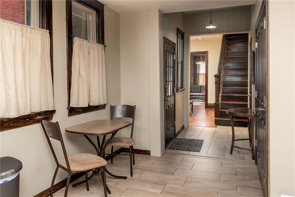 838 Spring Garden Avenue Pittsburgh, PA 15212 - Photo 11 of 24 a view of hallway with furniture and a window