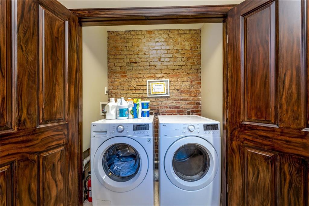 838 Spring Garden Avenue Pittsburgh, PA 15212 - Photo 12 of 24 a utility room with dryer and washer
