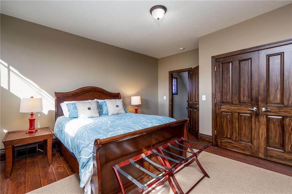 838 Spring Garden Avenue Pittsburgh, PA 15212 - Photo 15 of 24 a bedroom with a bed and a table
