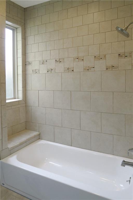 838 Spring Garden Avenue Pittsburgh, PA 15212 - Photo 19 of 24 a bathroom with a bathtub