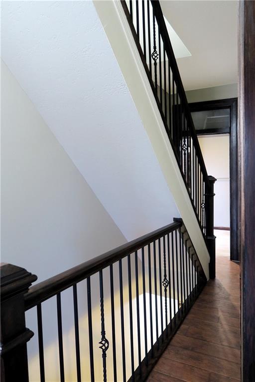 838 Spring Garden Avenue Pittsburgh, PA 15212 - Photo 20 of 24 a view of staircase with railing and white walls