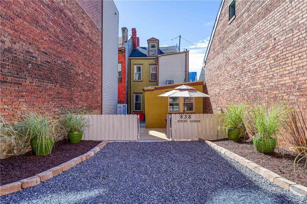 838 Spring Garden Avenue Pittsburgh, PA 15212 - Photo 24 of 24 a front view of a house with a yard