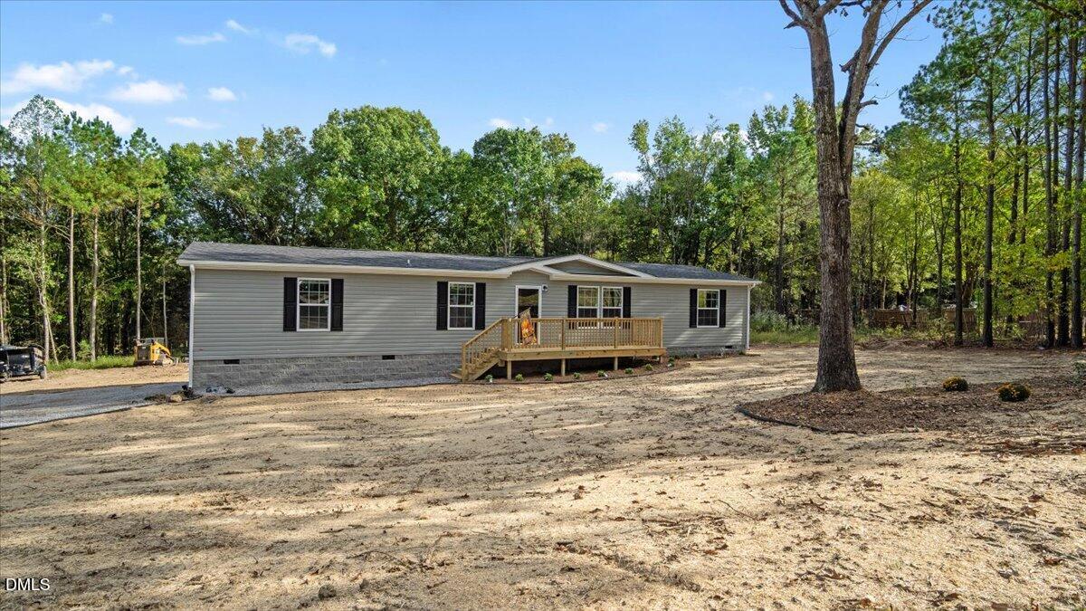 212 Ellington's Path Henderson, NC 27537 - Photo 1 of 36 a view of a house with a yard