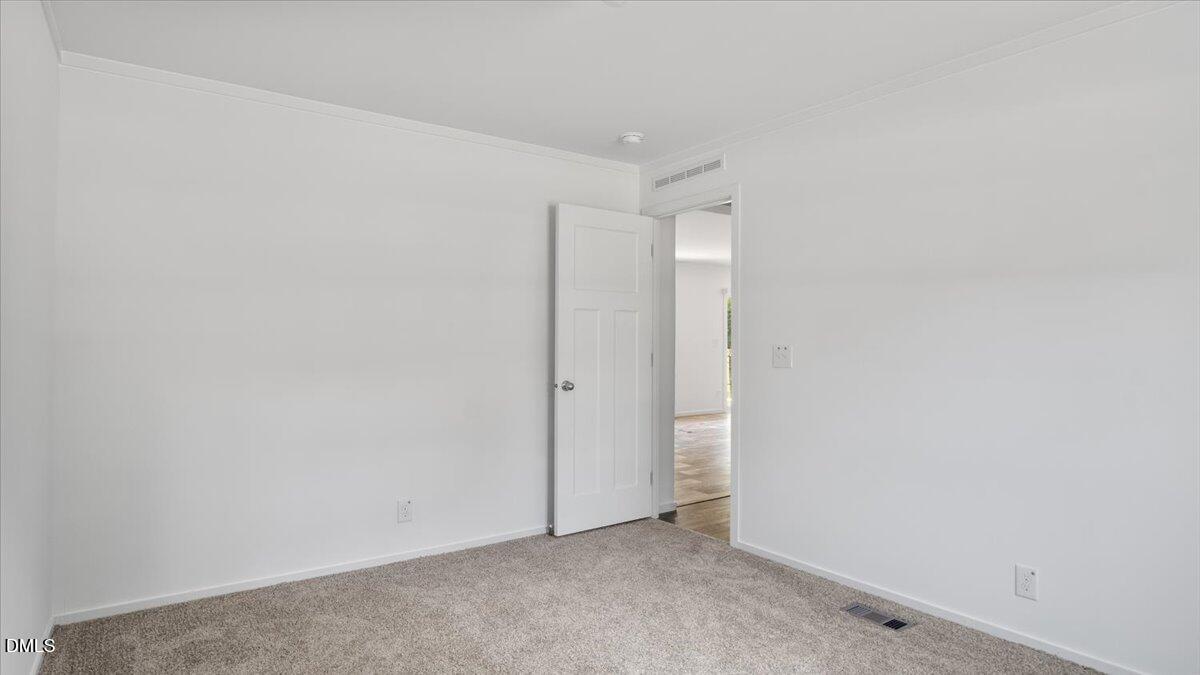 212 Ellington's Path Henderson, NC 27537 - Photo 14 of 36 a view of an empty room