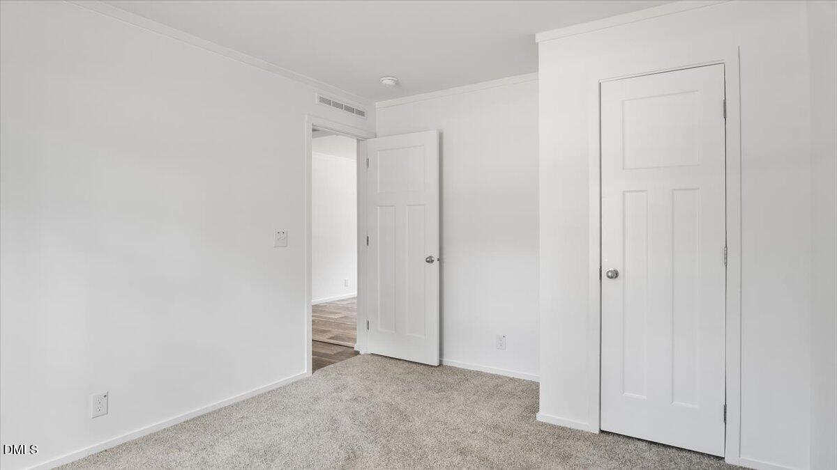 212 Ellington's Path Henderson, NC 27537 - Photo 16 of 36 a view of an empty room