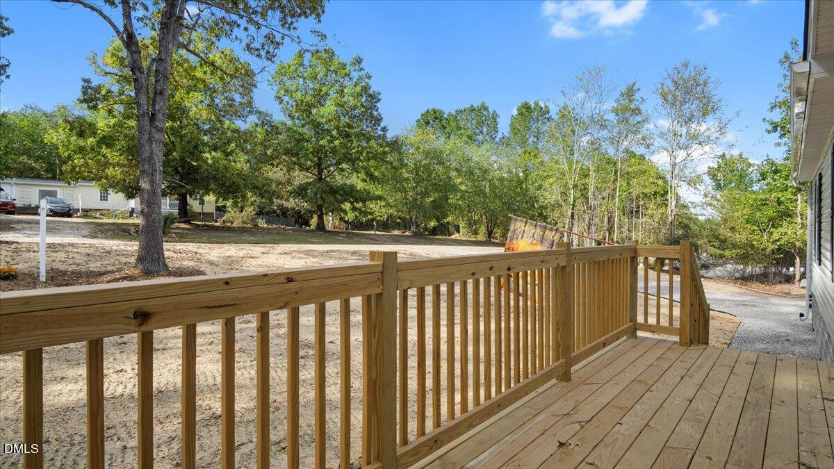 212 Ellington's Path Henderson, NC 27537 - Photo 27 of 36 a view of a balcony with wooden floor