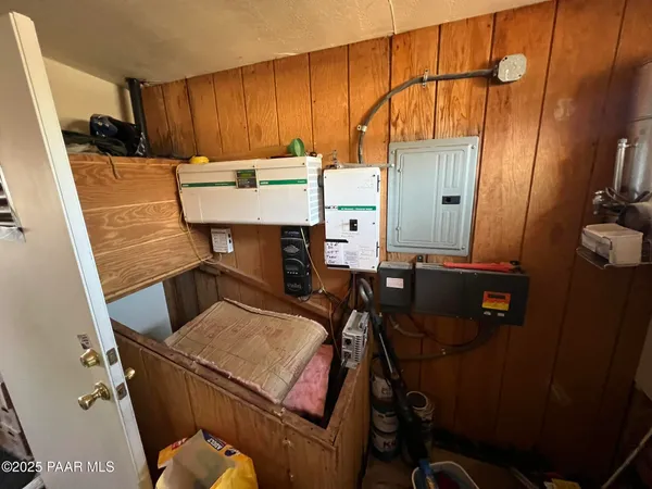 a room with furniture and a mirror