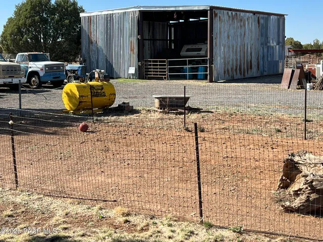 a house with a wooden bench