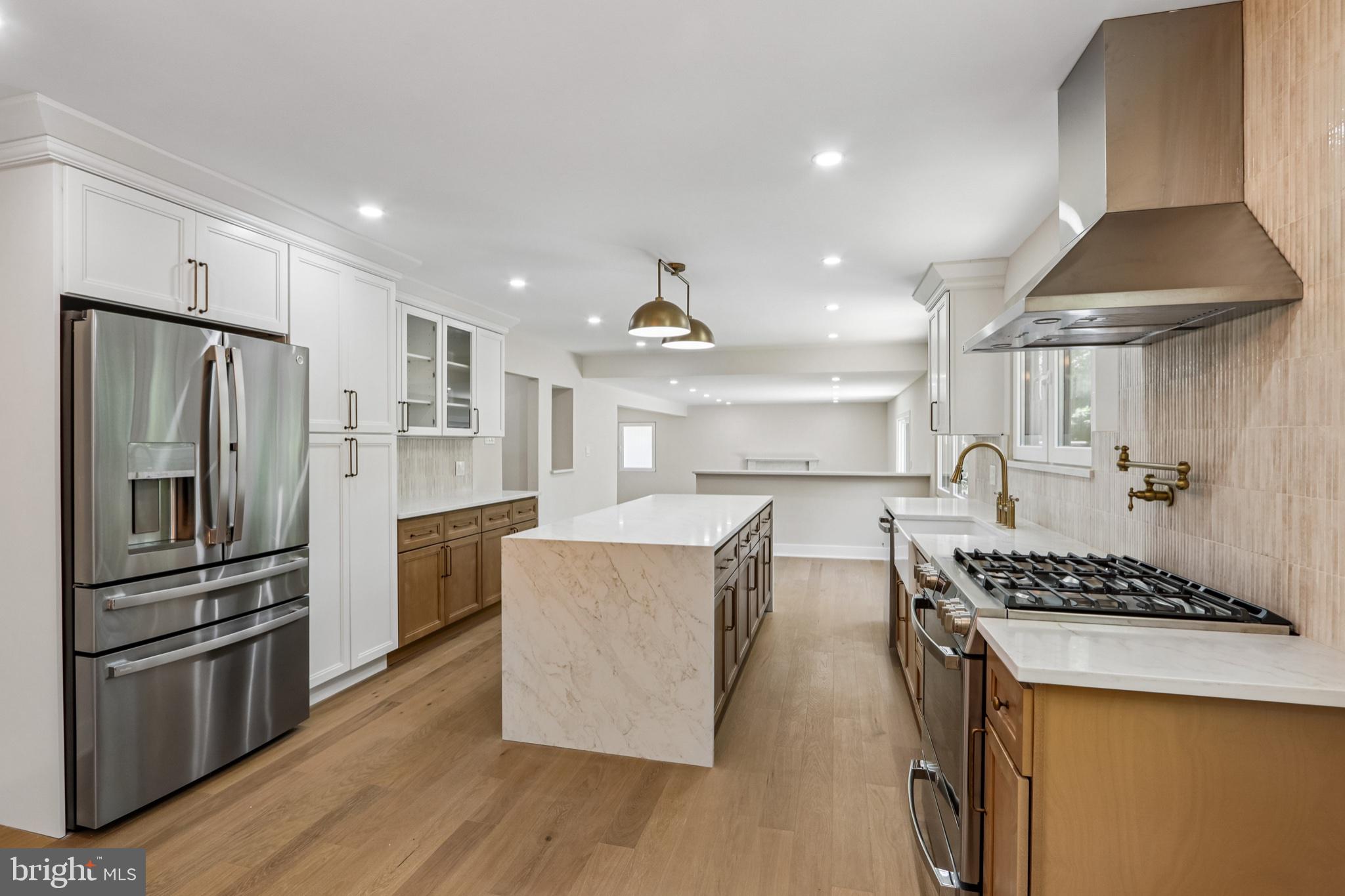 444 Rocksville Road Southampton, PA 18966 - Photo 19 of 72 a kitchen with stainless steel appliances kitchen island a refrigerator and a stove
