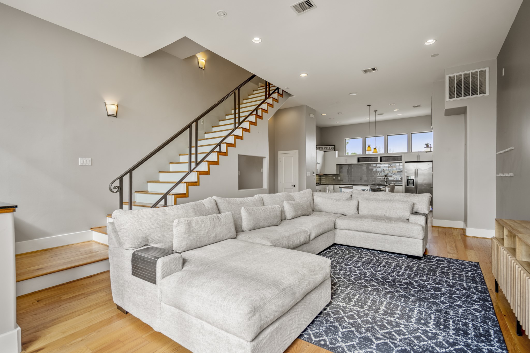 1310 West Dallas Street Houston, TX 77019 - Photo 21 of 50 a living room with furniture and kitchen view