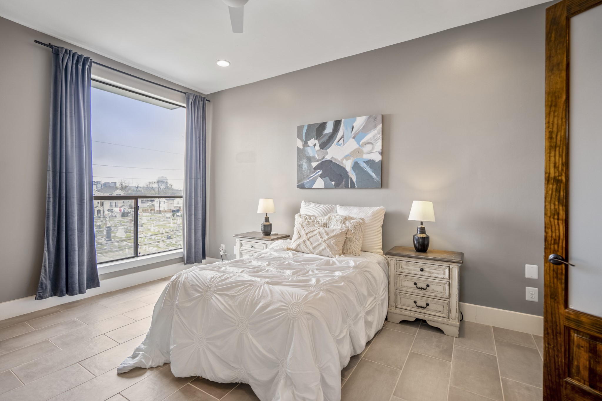 1310 West Dallas Street Houston, TX 77019 - Photo 29 of 50 a bedroom with a bed and a window