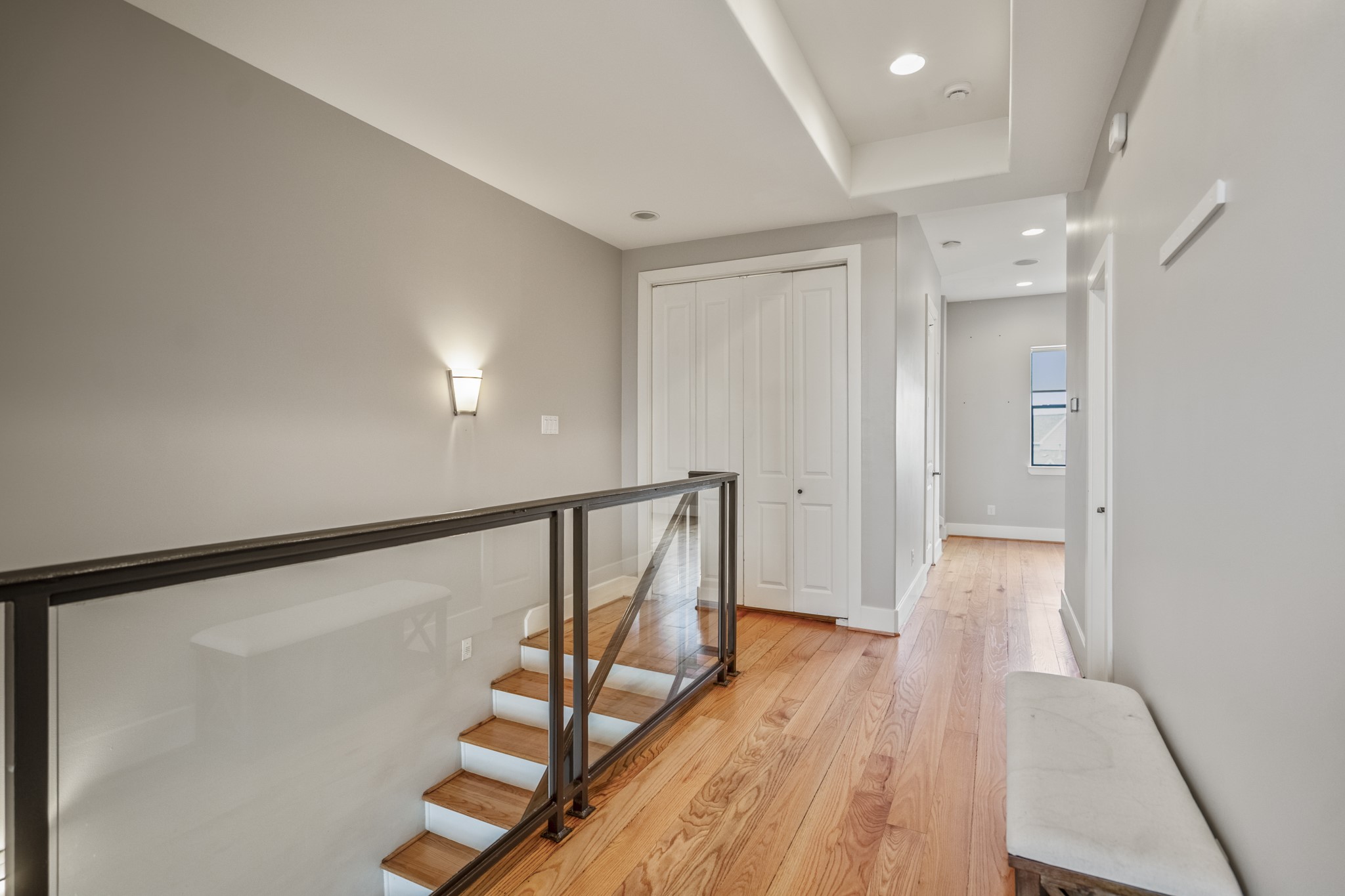 1310 West Dallas Street Houston, TX 77019 - Photo 36 of 50 a view of a hallway with wooden floor