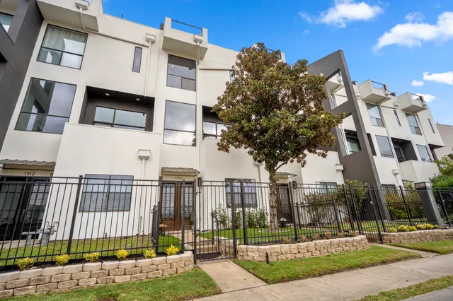 a view of a building with a street
