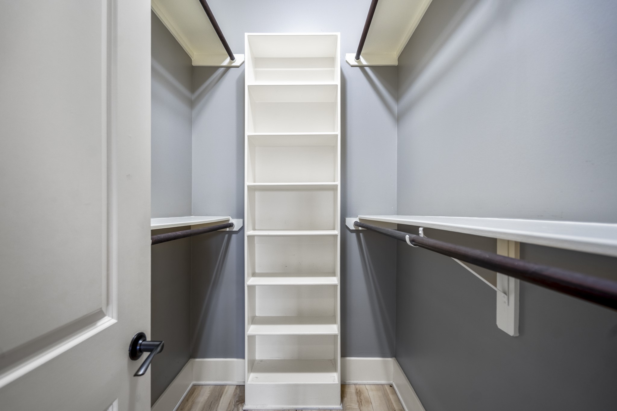 1310 West Dallas Street Houston, TX 77019 - Photo 10 of 50 a view of walk in closet with empty racks