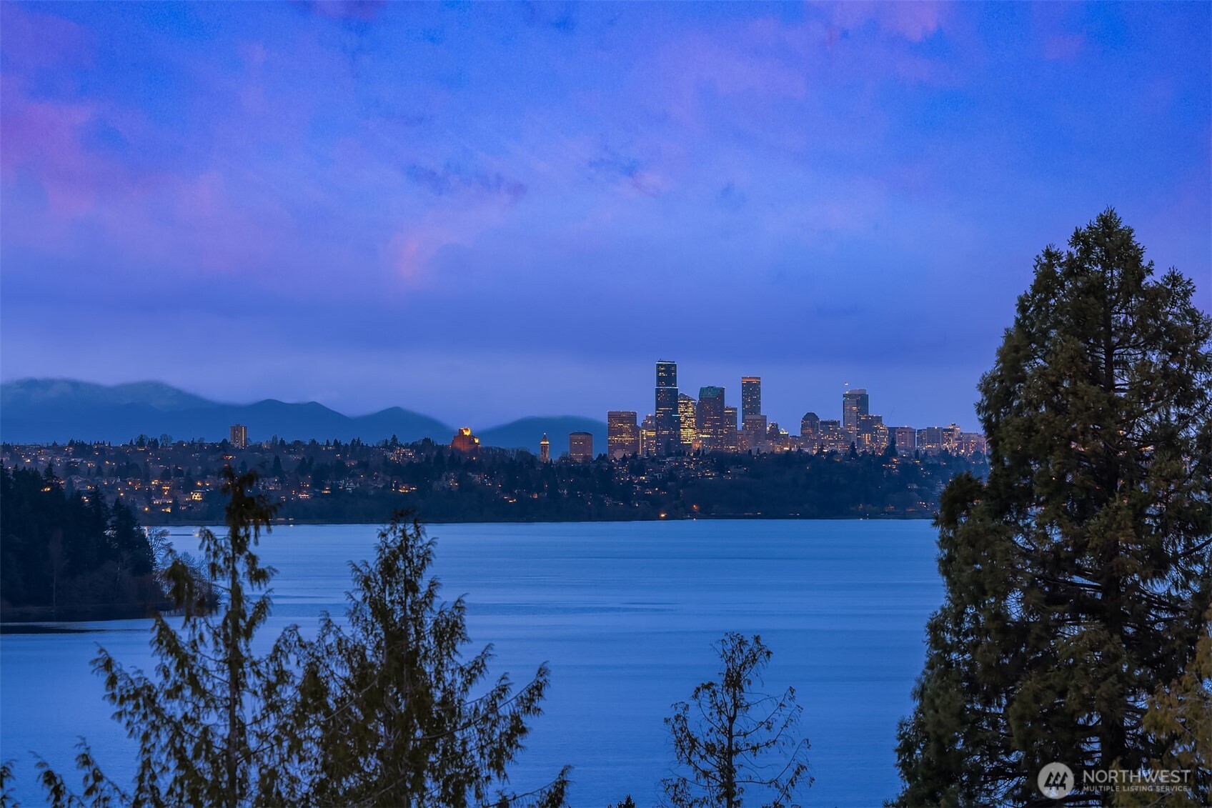 5340 West Mercer Way Mercer Island, WA 98040 - Photo 15 of 36 a view of a lake with a city