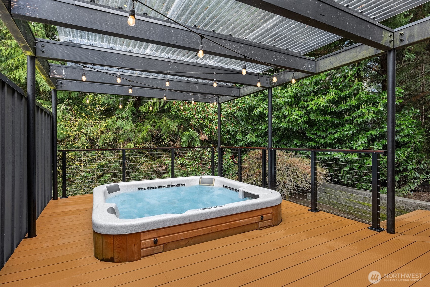 5340 West Mercer Way Mercer Island, WA 98040 - Photo 17 of 36 a house view with a outdoor seating