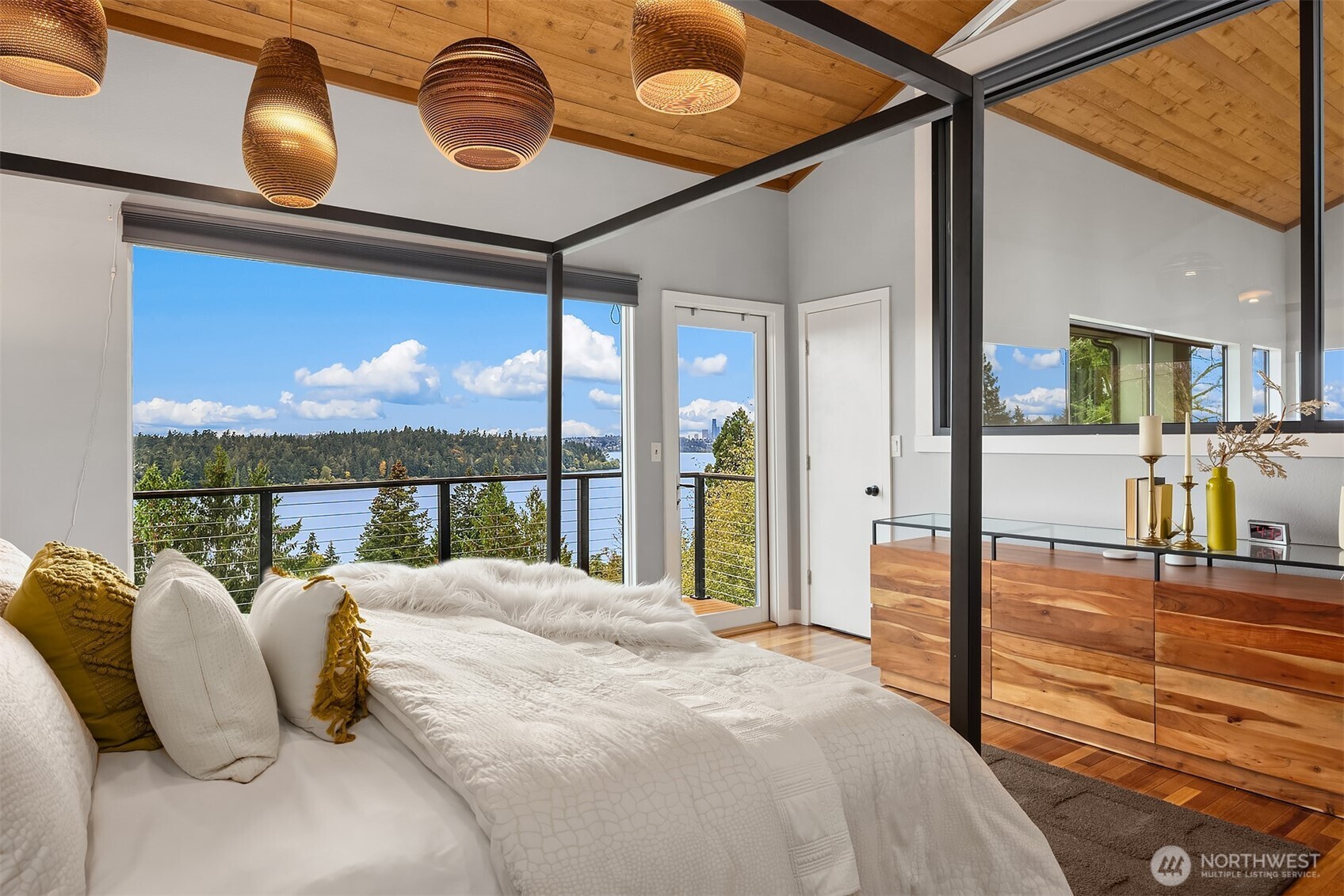 5340 West Mercer Way Mercer Island, WA 98040 - Photo 19 of 36 a bedroom with a bed and window