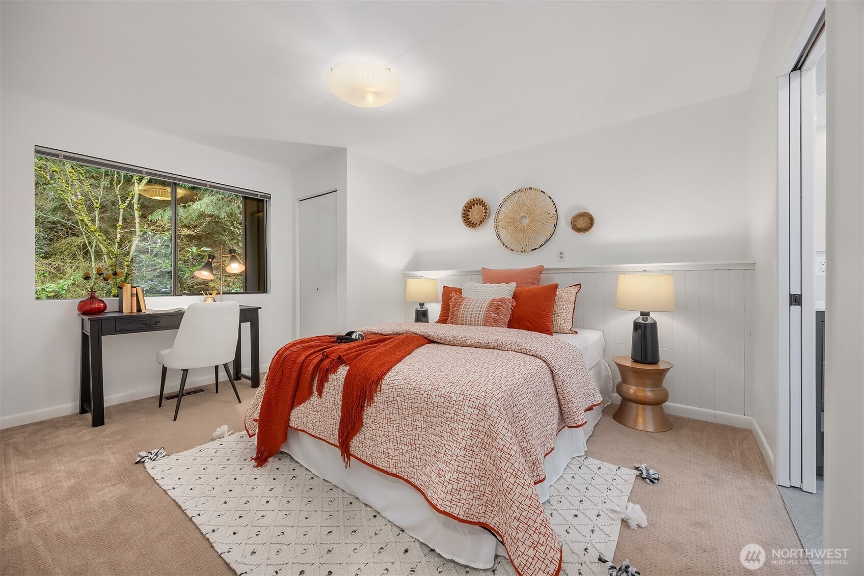 5340 West Mercer Way Mercer Island, WA 98040 - Photo 28 of 36 a bedroom with a bed and window