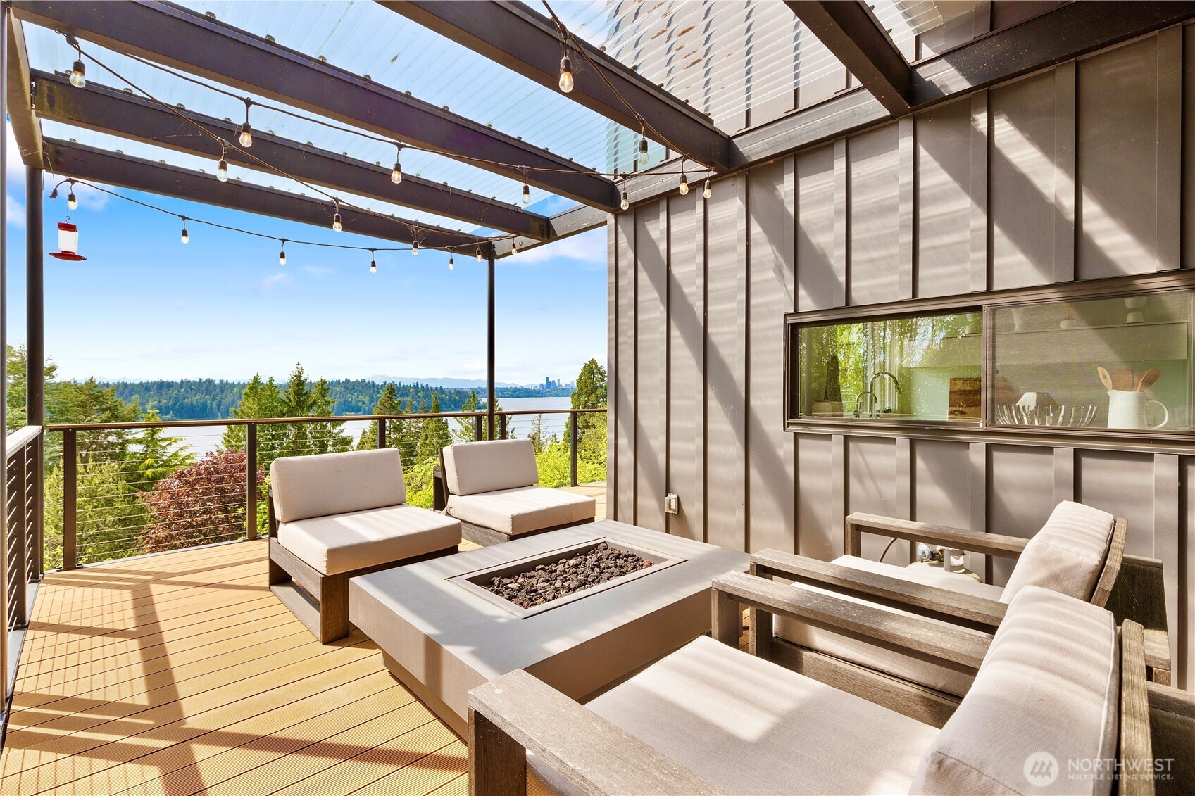 5340 West Mercer Way Mercer Island, WA 98040 - Photo 6 of 36 a roof deck with couches and potted plants